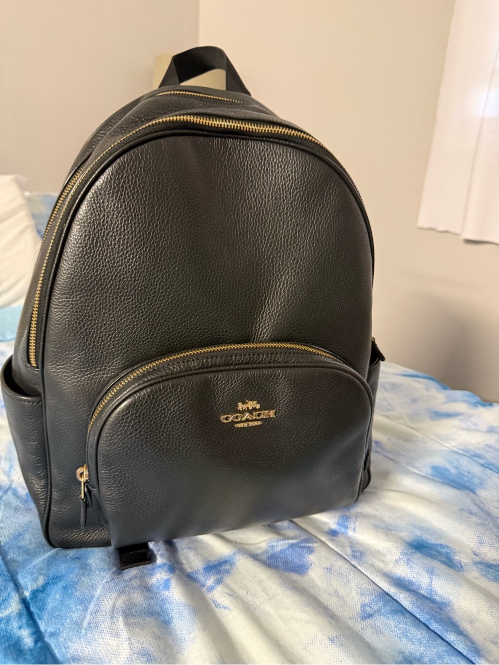 Coach Black Pebbled Leather Backpack with Gold Hardware Accents